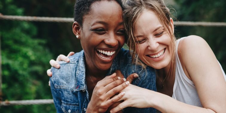 Female same sex couple embracing.
